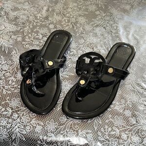 Tory Burch Black Sandals with Gold Details